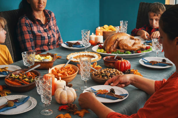 istock Family Having Traditional Holiday Stuffed Turkey Dinner 1279176657