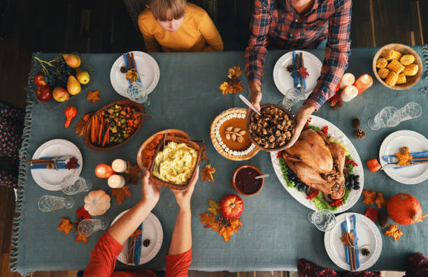 istock Family Having Traditional Holiday Stuffed Turkey Dinner 1279177222