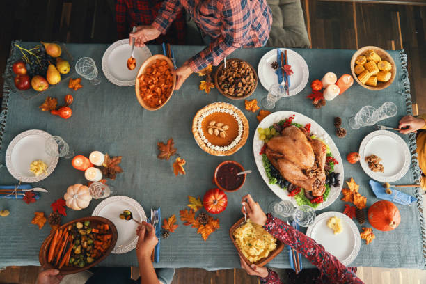 istock Family Having Traditional Holiday Stuffed Turkey Dinner 1279177312