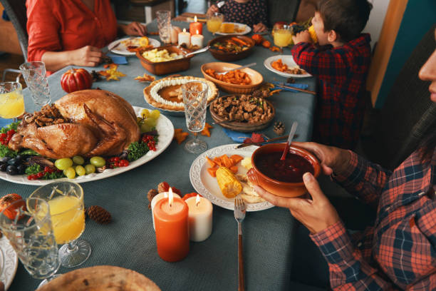 istock Family Having Traditional Holiday Stuffed Turkey Dinner 1279177380