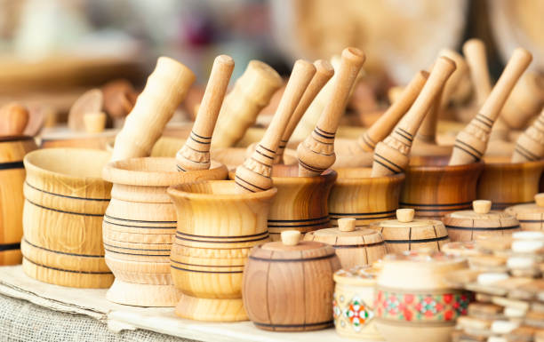 istock Wooden mortars, barrels, crafts at the fair 1279178620
