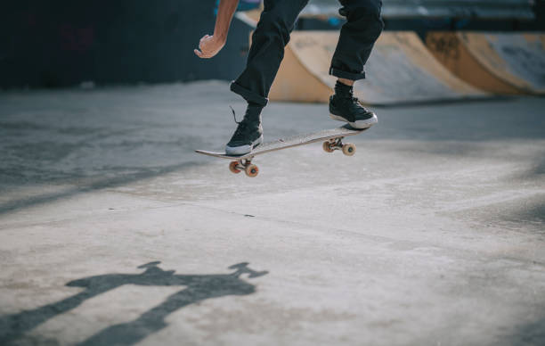 istock Asian skateboarder in action mid air x games 1279180068