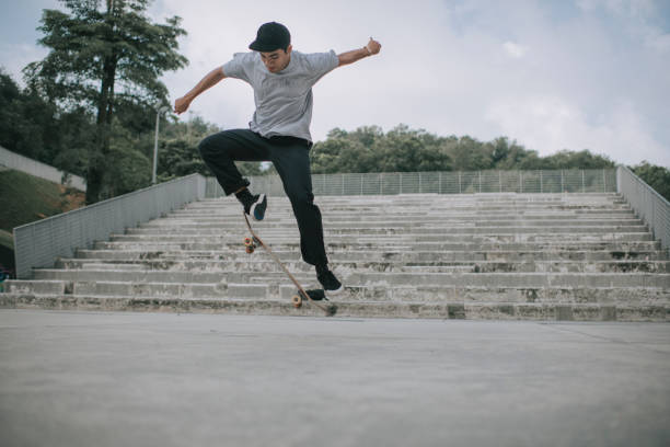 istock Asian skateboarder in action mid air x games 1279180101