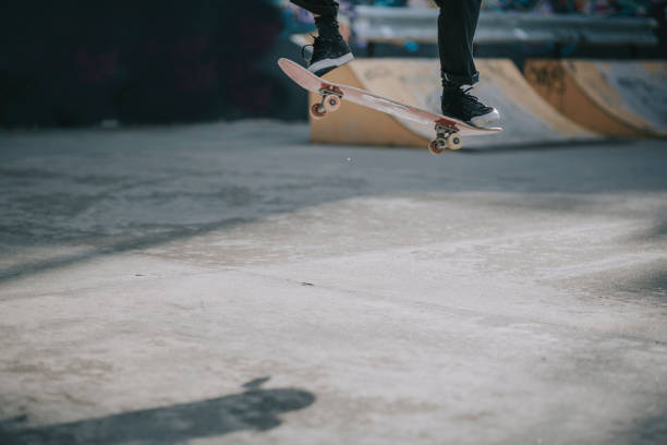 istock Asian skateboarder in action mid air x games 1279180115