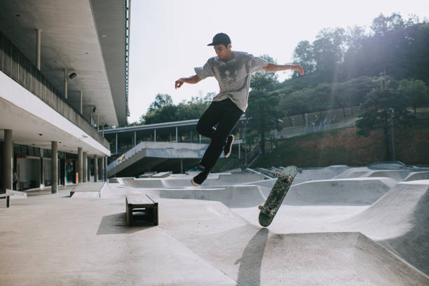 istock Asian skateboarder in action falling down failing 1279180142