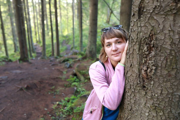 istock Woman in pine forest 1279180532