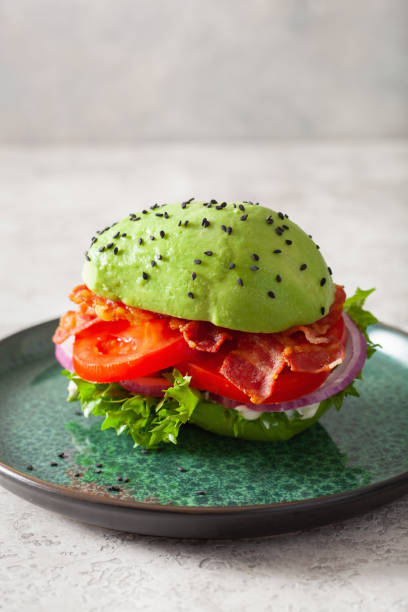 istock keto paleo diet avocado burger with bacon, lettuce, tomato 1279181141