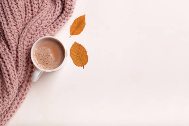 istock Autumn cozy composition, cup of coffee, pink pastel plaid on white background. 1279182636