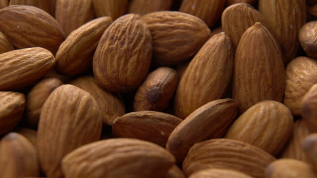 Almonds heap rotating with close up shot