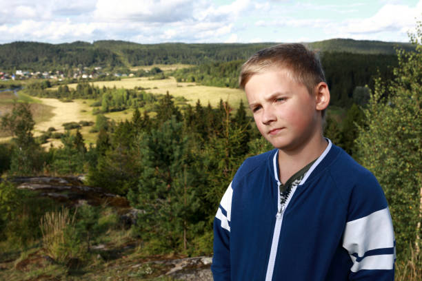 istock Thinking Kid On Mount Paaso in Karelia 1279183260