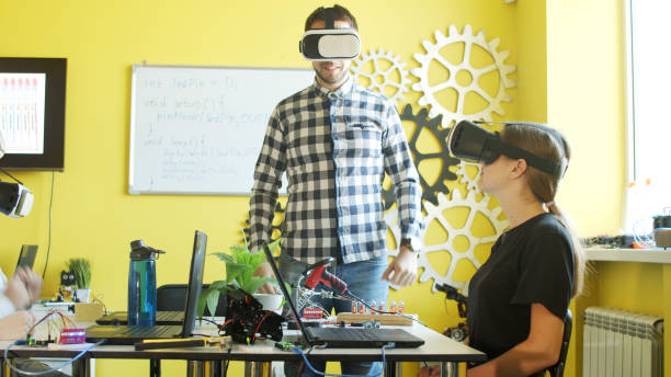 istock Young students and teacher with robot in classroom 1279184886