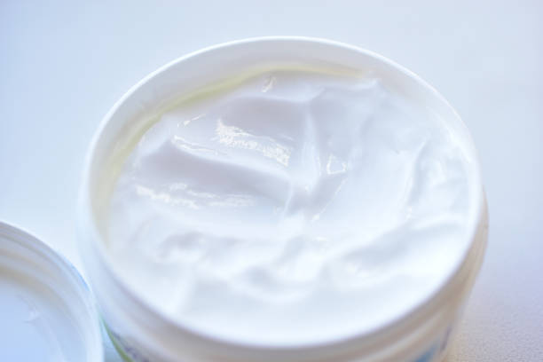 istock Big white jar with white cosmetic cream 1279189975
