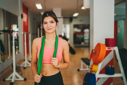 Portrait of young woman in the gym