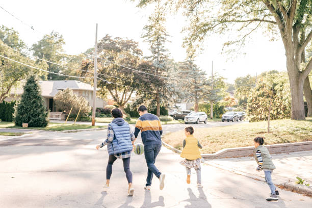 istock Parents and kids having fun outdoor 1279190086