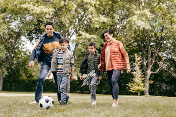 istock Nice autumn day for soccer with family 1279190238