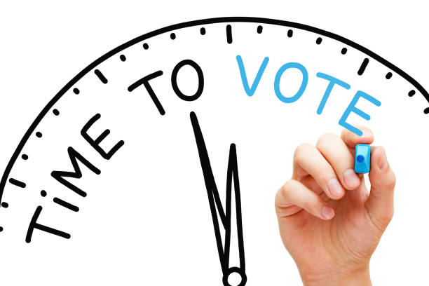 istock Time To Vote Elections Clock Concept 1279190626
