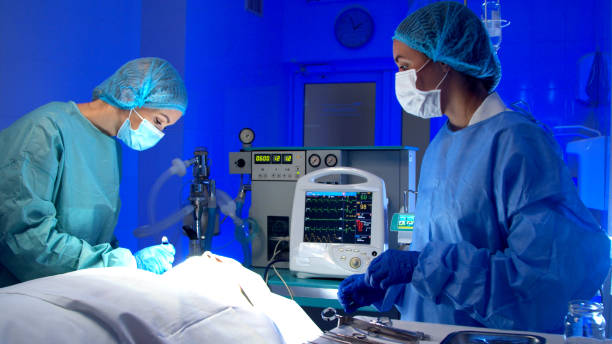istock Surgeon doing surgery in operating room in hospital 1279190743