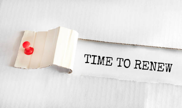 istock The text TIME TO RENEW appearing behind torn yellow paper 1279194172