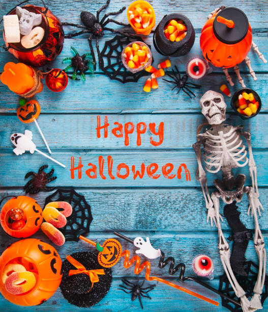 istock Halloween party decorations frame on blue wooden rustic table 1279195645