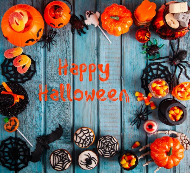 istock Halloween party decorations frame on blue wooden rustic table 1279195651