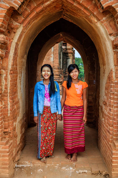 istock Young Burmese girls walking in Bagan, Myanmar 1279195958