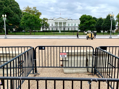 Washington, DC, USA - September 25, 2020: Fences and Secret Service guard North Façade of White House in Washington, D.C. USA.