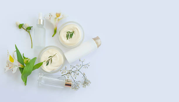 istock cosmetic cream, flower on white background 1279202280