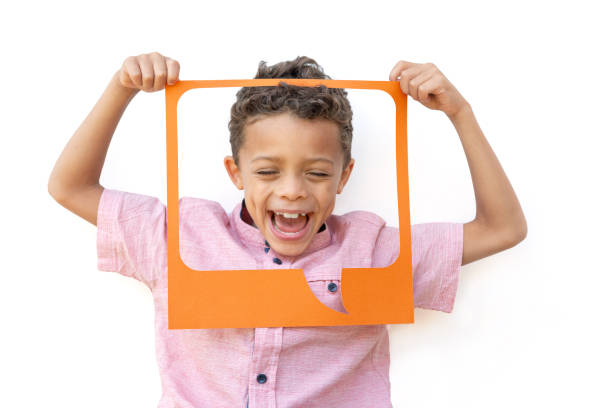 Happy Mixed Race Little Boy Showing Positive Feedback in Orange Speech Texting Bubble