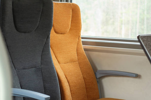 istock Railroad train interior seats and window. Inside of russian suburban train 1279206119