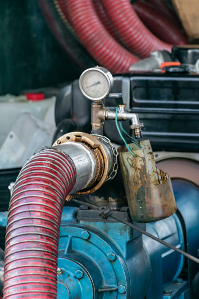 istock Fuel hose connected to a motorized pump 1279206799