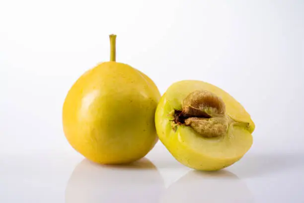Fresh yellow howthorn on white background