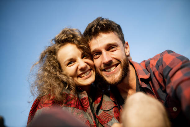 istock Selfie of two positive people 1279209563