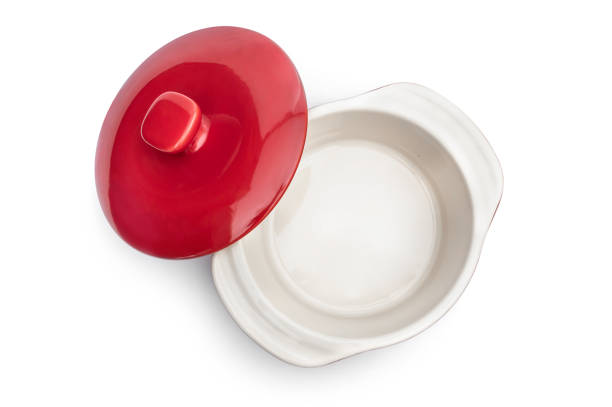 istock Opened red ceramic pot with lid on white. Soup tureen. 1279209662