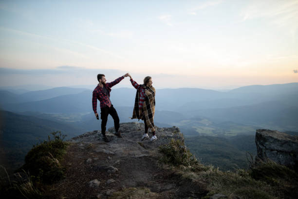 istock A couple is dancing in mountains at the sunset 1279210773