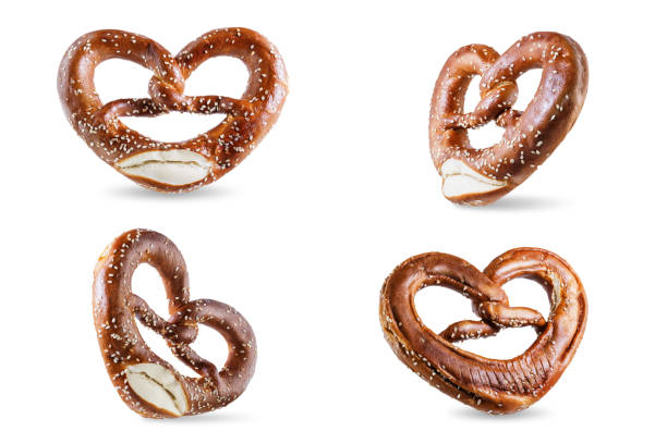 istock Pretzel with salt and sesame seeds on a white isolated background 1279212550