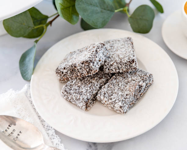 istock Lamington Cake with Plant Leaves and Spoon 1279213432