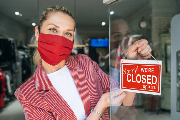 istock Shop owner closed down due to Coronavirus second wave.Sorry we`re closed again 1279214364
