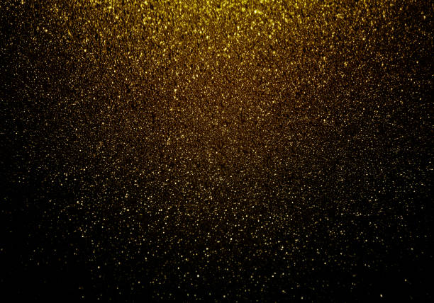 istock Shiny gold and black glitter texture background 1279218317