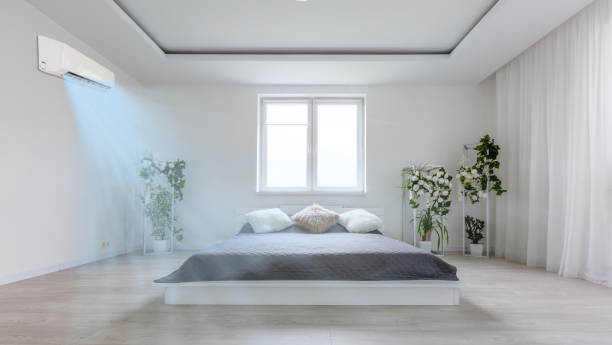 istock Modern bright living room with air conditioning, white wall. 3D rendering 1279219379