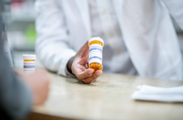 istock Picking up prescription medicine 1279220099