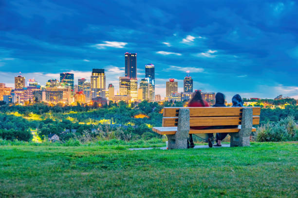 istock Edmonton Skyline Alberta Canada People relax on bench 1279220383