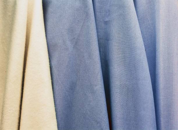 istock Detailed close up view on samples of cloth and fabrics in different colors found at a fabrics market 1279223621