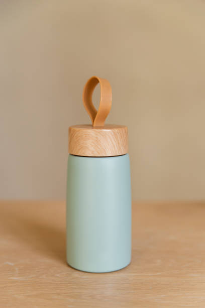 istock Reusable vacuum eco friendly aluminium cup for take away on wooden table. Zero waste. 1279224389