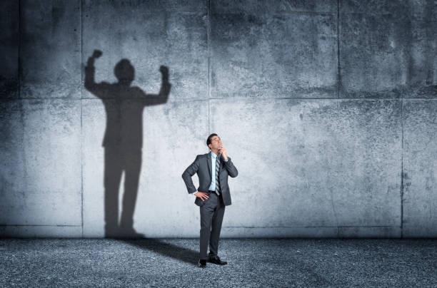 istock Shadow Of Man Aspiring To Confidence 1279226571