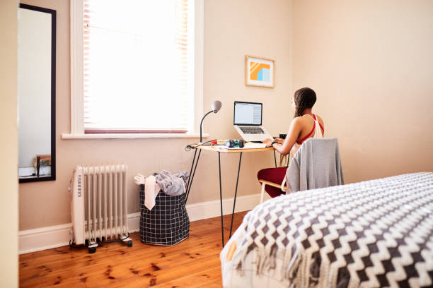 istock Young woman working online from home using a laptop 1279227498