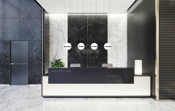 Modern Offices lobby interior area with elevators and stairs and with long reception desk Modern and luxurious Offices lobby interior area with elevators and stairs. Long reception desk.
Black marble wall tiles decoration. 3d rendering gold desk lamp stock pictures, royalty-free photos & images