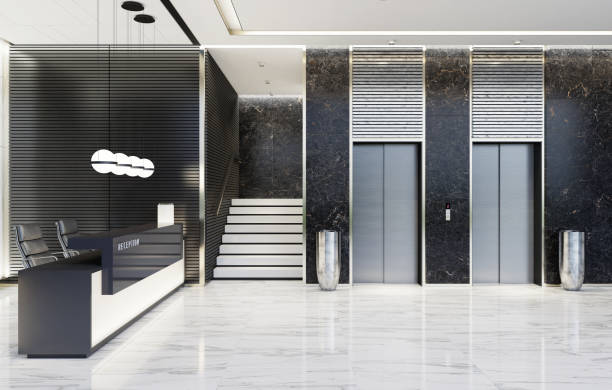 Modern Offices lobby interior area with elevators and stairs and with long reception desk Modern and luxurious Offices lobby interior area with elevators and stairs. Long reception desk.
Black marble wall tiles decoration. 3d rendering gold desk lamp stock pictures, royalty-free photos & images