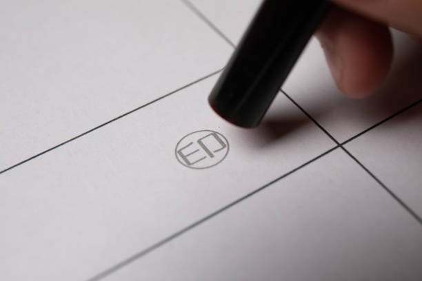 istock Black Hanko about to stamp paper 1279236126