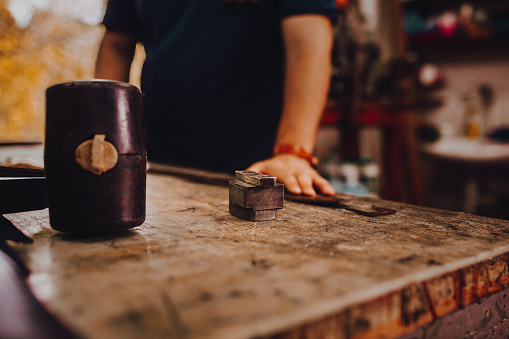 Leather workshop owner