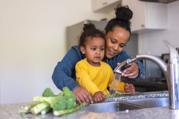 istock Mother and son work in the kitchen together 1279240591
